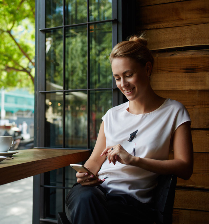 woman on phone in coffee shop