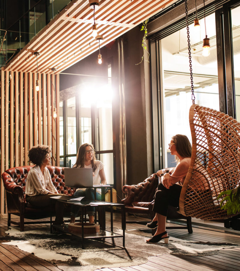 women discussing in lobby